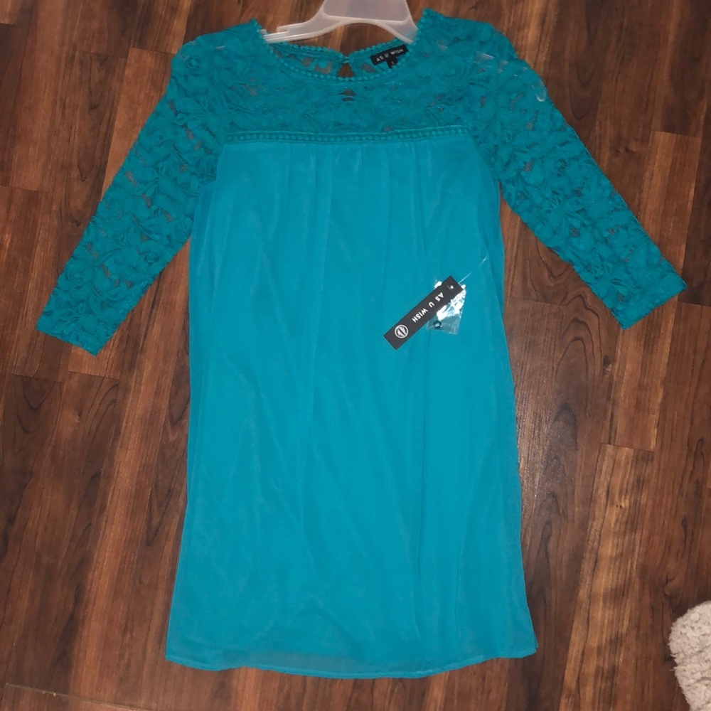 Turquoise dress with lace